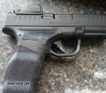 springfield armory Hellcat pro with viridian greendot 3- 17 round magazines and papers excellent shape